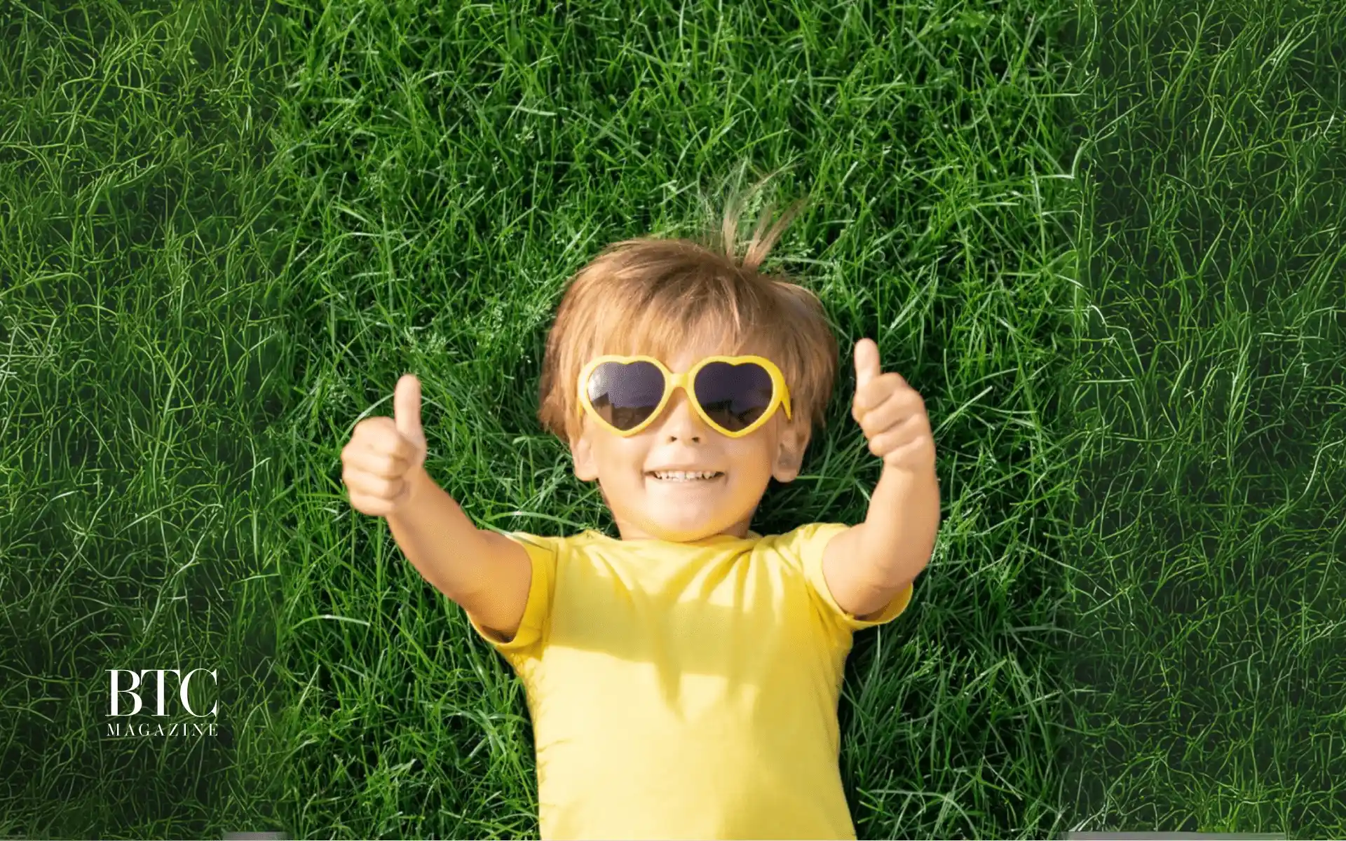 Family playing backyard lawn games sprinklers